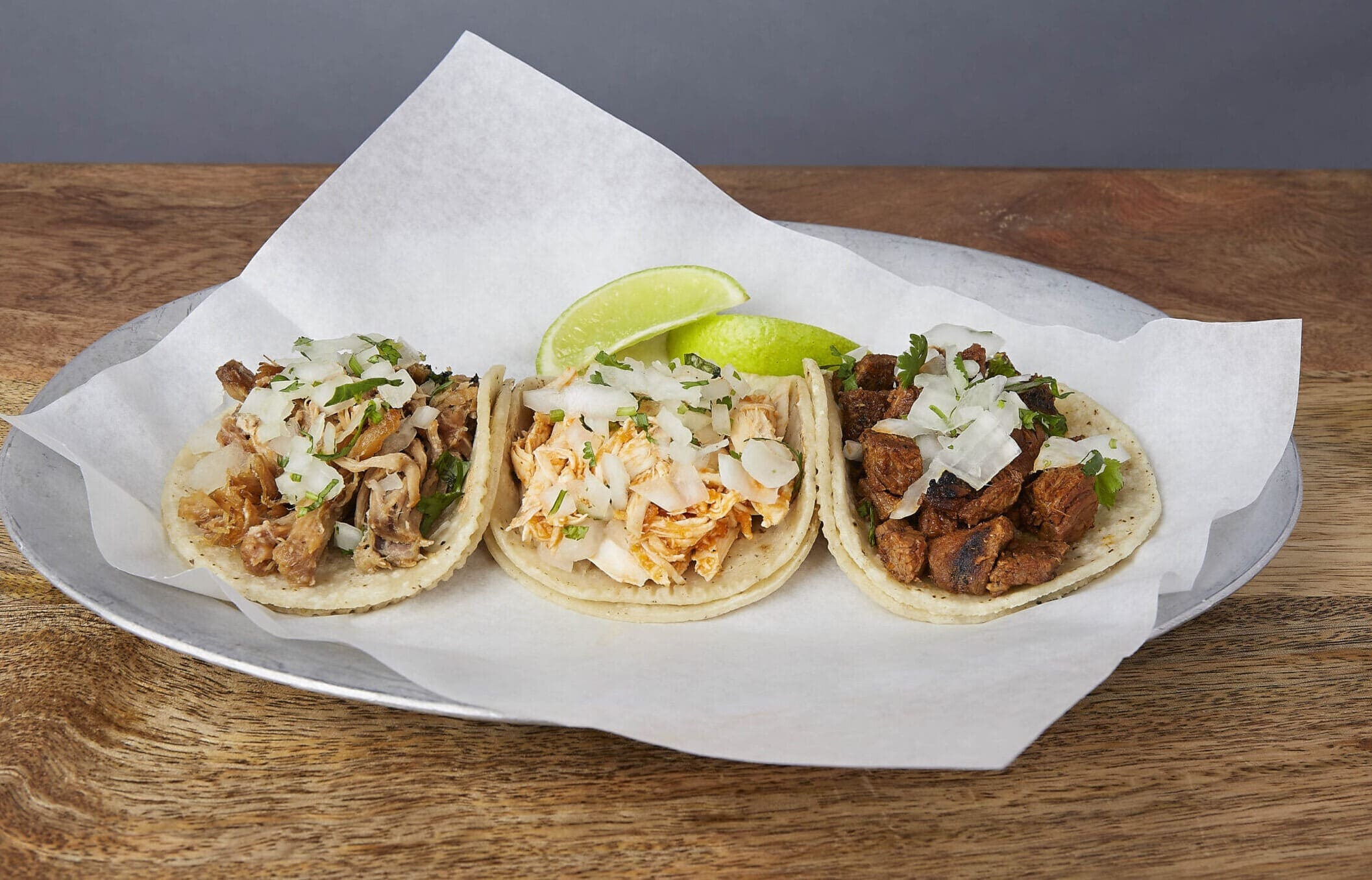 Image of three street style tacos